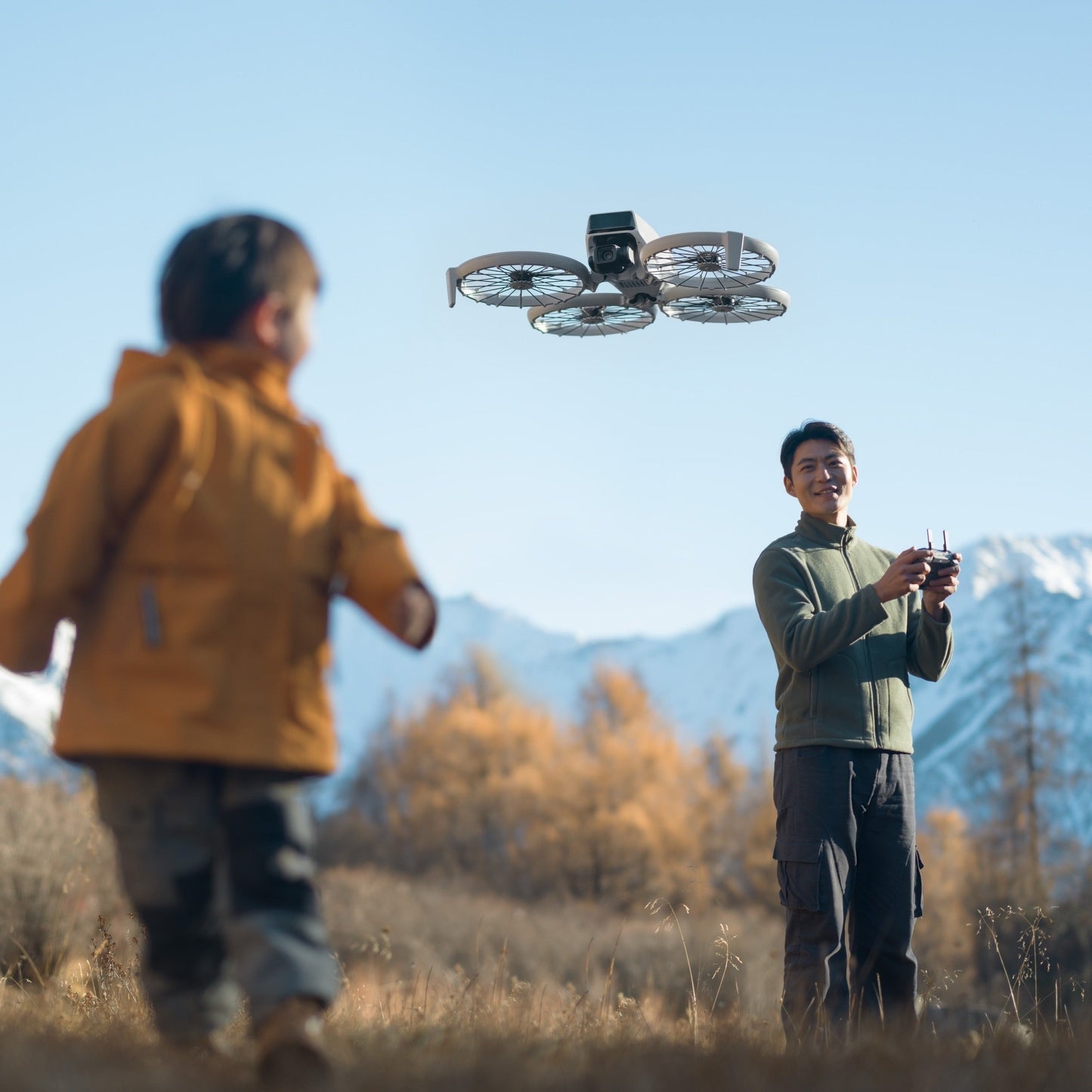 DJI Flip Fly More Combo Camera Drone with DJI RC 2, Extra Batteries, Charging Hub, and Bag (White)