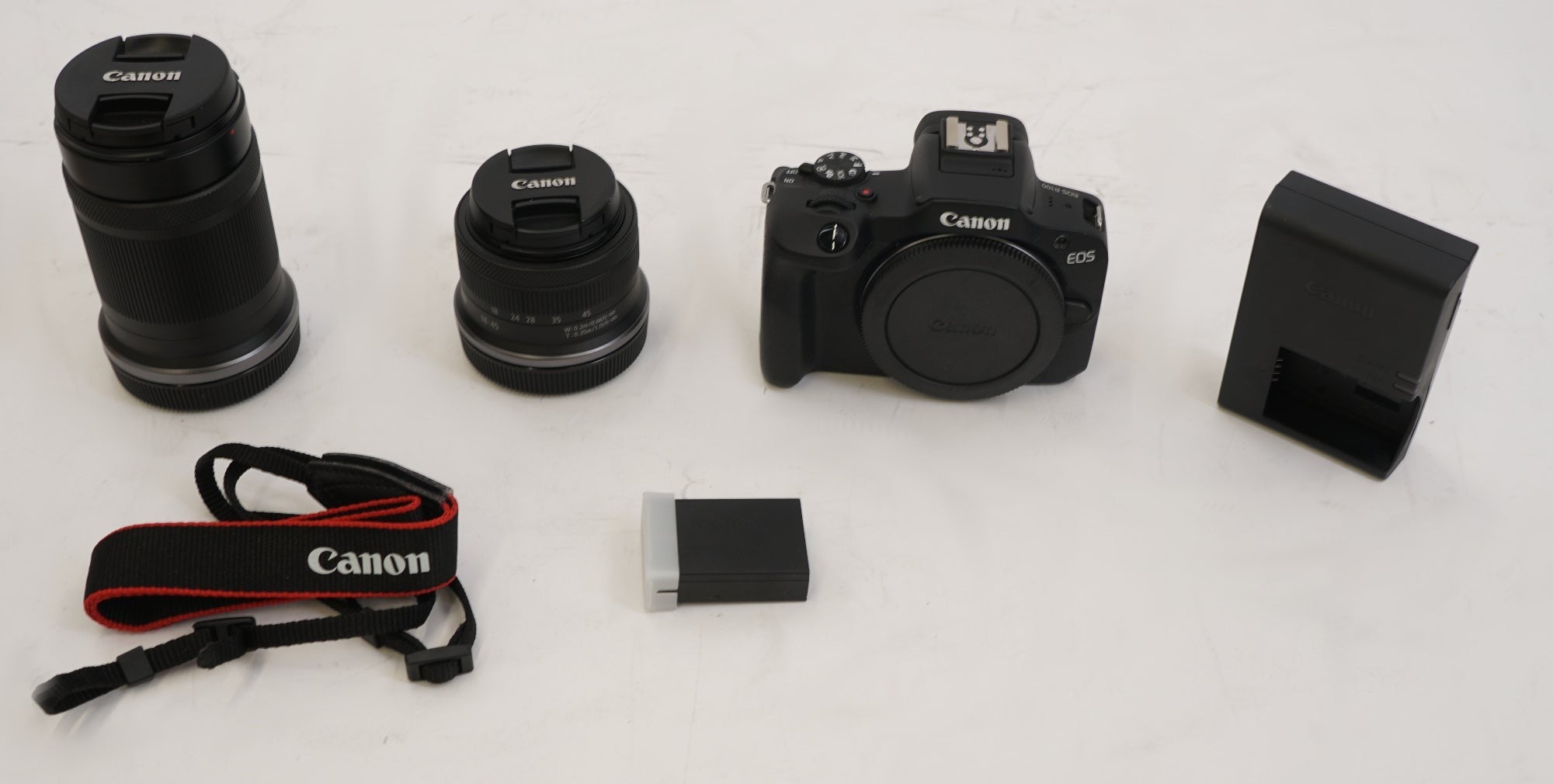 Canon EOS R100 Mirrorless Camera with 18-45mm and 55-210mm Lenses (Used)