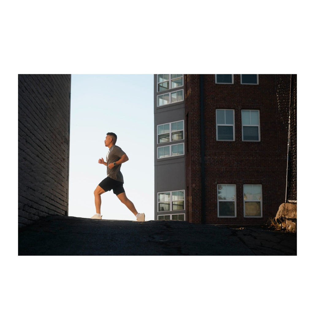 Garmin Forerunner 570 42mm (Cloud Blue/Whitestone) GPS Smartwatch with Earbuds
